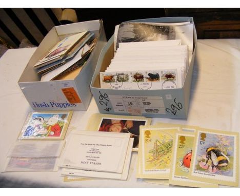 Two shoe boxes of First Day Covers, PHQ cards etc