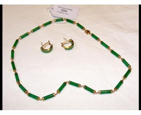 A 14ct jade necklace with 14ct earrings