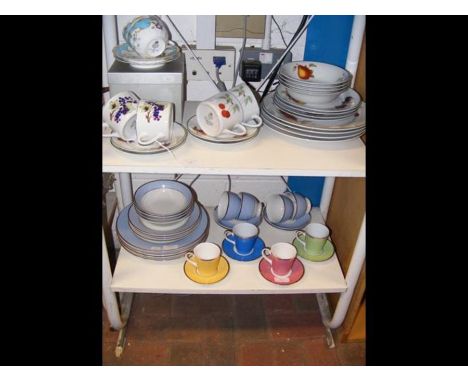 A medley of Royal Worcester 'Evesham Vale' tableware, Royal Worcester 'In Celebration of HRH 80th Birthday' cups and saucers,