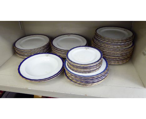 Ceramic tableware: to include a late Victorian china dinner service, decorated with royal blue and gilt banding      OS10