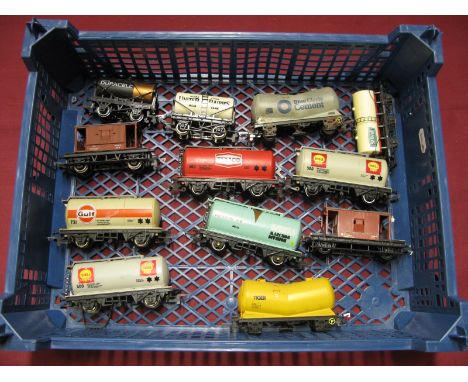 Twelve 'OO' Scale Four and Six Wheel Wagons, by Hornby and others, mainly tankers, playworn.