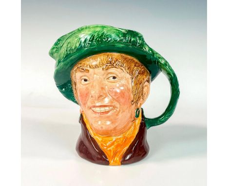 Green hat, brown coat, yellow scarf.Arriet is a coster of costermonger, a cockney woman who sold fruits and vegetable from a 