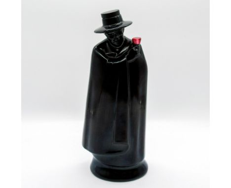Black glazed ceramic; depicting the Sandeman mascot holding a red wine glass in right hand.Royal Doulton backstamp. Bottle is