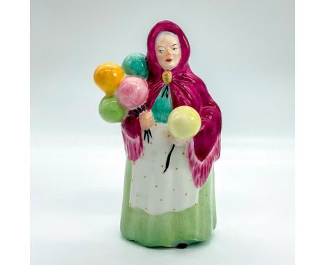 Hand painted porcelain of a lady holding balloons of various coloration. Coalport backstamp on base.This item has no reserve.