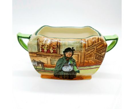 A colorful Dickens ware with green trim; transfer print of the character from the novel 'Martin Chuzzlewit'.Model number D297