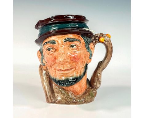 Maroon and grey cap, brown robes.John Chapman (1774 - 1845) was and American pioneer who sold and gave saplings and apple see