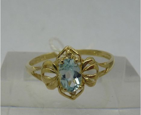 A 9ct gold, blue topaz and diamond ring, weight 1.1g, size O