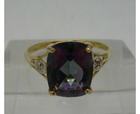 A 9ct gold, diamond and mystic topaz ring