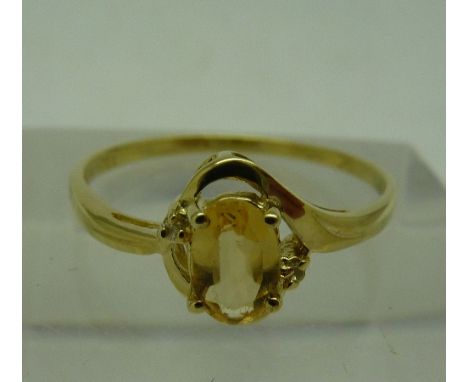 A 9ct gold and citrine ring, weight 1.0g, size N