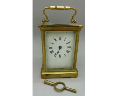 A brass four glass sided carriage clock