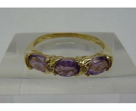 A 9ct gold, amethyst and diamond ring, weight 1.6g, size N