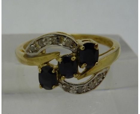 A 9ct gold sapphire and diamond ring, weight 1.7g, size N