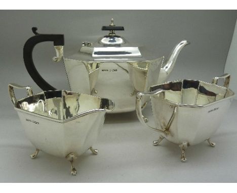 A three piece silver tea service, Sheffield 1945, total weight 1179g