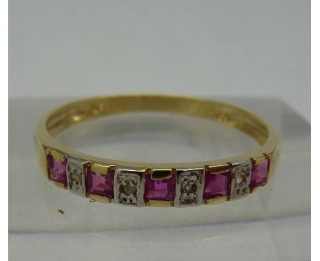 A 9ct gold, diamond and ruby ring, weight 1.1g, size N