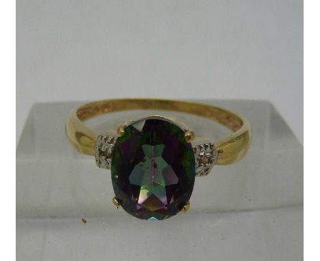 A 9ct gold, diamond and mystic topaz ring, weight 1.4g, size N