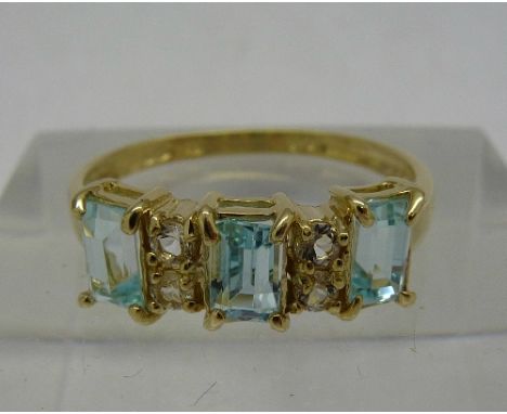 A 9ct gold diamond and aquamarine ring, weight 1.5g, size N