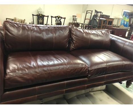 A Three seater Ralph Lauren Brown leather sofa