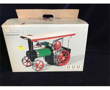 A boxed Mamod Steam tractor.