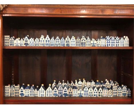 A large selection of KLM delftware houses, used to contain Gin.