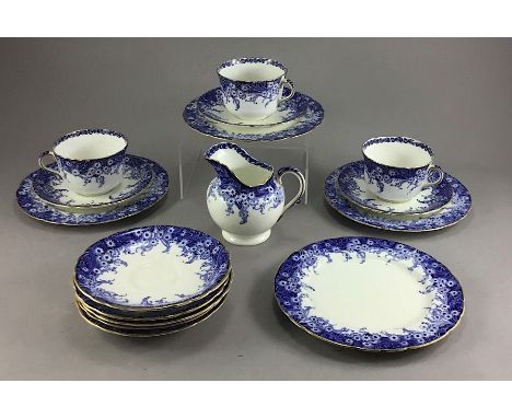 An Edwardian Royal Doulton Paris pattern part tea set, transfer printed floral and crested foliage with gilt rim and handle d