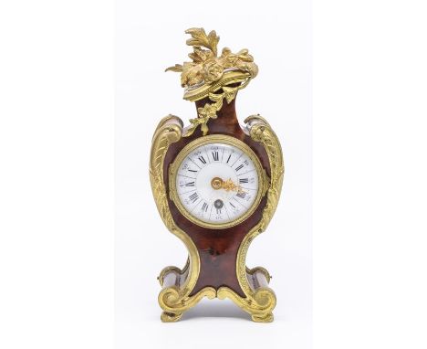 A late 19th century French tortoiseshell and git brass mounted mantel clock, the white enamel dial with Roman numerals, 20cm 