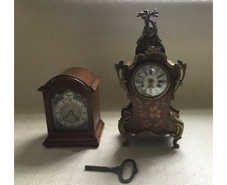 A Davall carriage clock, mahogany case H 13cms), and a French style marquetry and ormolu clock, cracked face H 24cms [2]