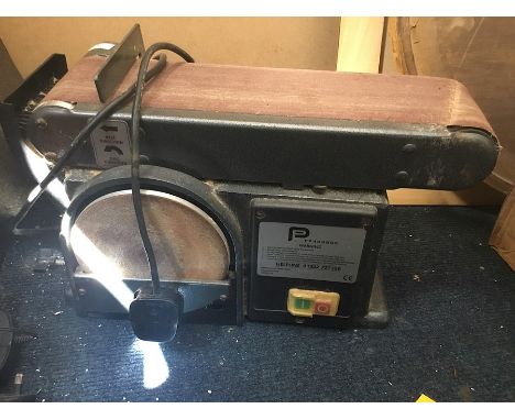A belt sander and a bench grinder [2]