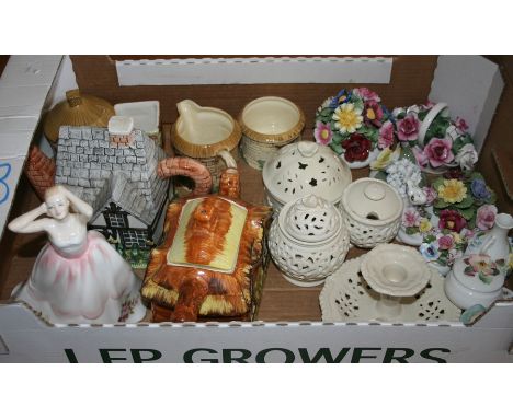 A large collection of ceramics comprising:- two novelty teapots in the form of houses one by Waters House the other by Prince