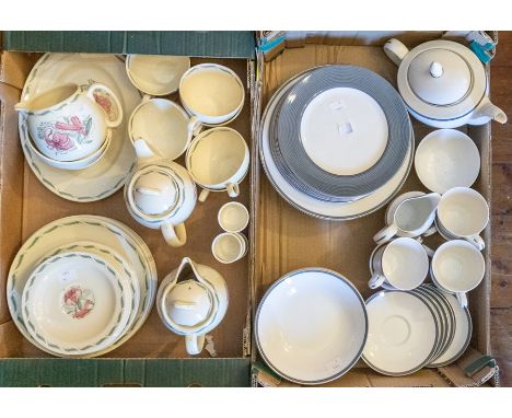 A Susie Cooper part breakfast service, pattern 1999 and a Royal Doulton "Columbus" pattern part dinner and tea service