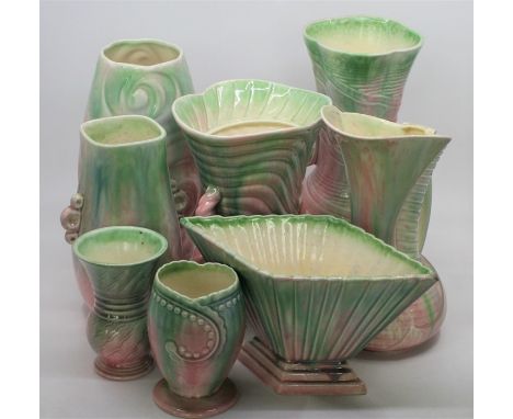 A collection of SylvaC pink and green design moulded vases and jugs (8)