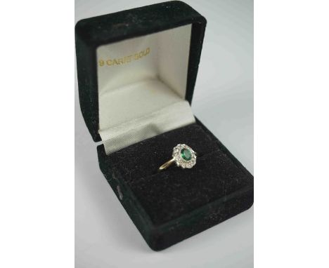 9ct Gold and Gem Set Cluster Ring, Set with a small green Gemstone to the centre, Flanked with small Zircon stones, Stamped 3