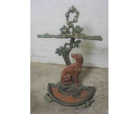 Painted Cast Iron Stick Stand, Decorated with an Applied figure of a Dog, With Drip tray, 69cm high  