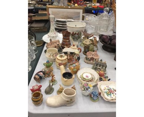 A QUANTITY OF CERAMIC ITEMS TO INCLUDE VASES, COTTAGES, SMALL TRINKETS, PLATES, ETC 