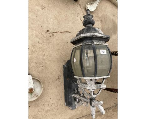 A LARGE DECORATIVE OUTSIDE LIGHT 