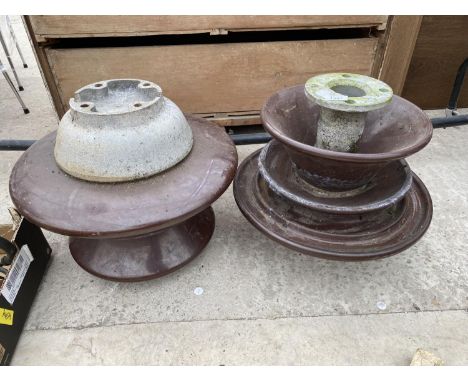 A PAIR OF GARDEN WATER FEATURES FORMED FROM CERAMIC ELECTRICITY RESISTORS 
