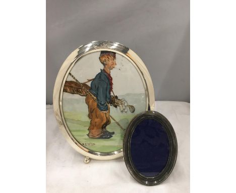 A FRAMED WATERCOLOUR OF A GOLFING CADDY SIGNED D. F. WILSON PLUS AN OVAL WHITE METAL PHOTO FRAME 