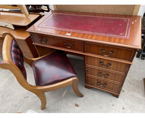 AN ANTIQUE STYLE COMPUTER DESK WITH INSET LEATHER TOP 40"X20" AND OXBLOOD CHAIR WITH BUTTON BACK 