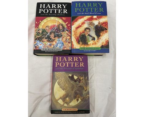 THREE FIRST EDITION HARRY POTTER BOOKS TO INCLUDE HARRY POTTER AND THE HALF BLOOD PRINCE, HARRY POTTER AND THE DEATHLY HALLOW