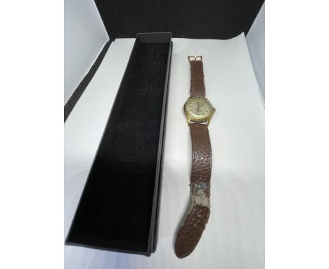 A VINTAGE SULLY SPECIAL 15 JEWEL AUTOMATIC WRIST WATCH WITH BROWN LEATHER STRAP IN A PRESENTATION BOX SEEN WORKING BUT NO WAR