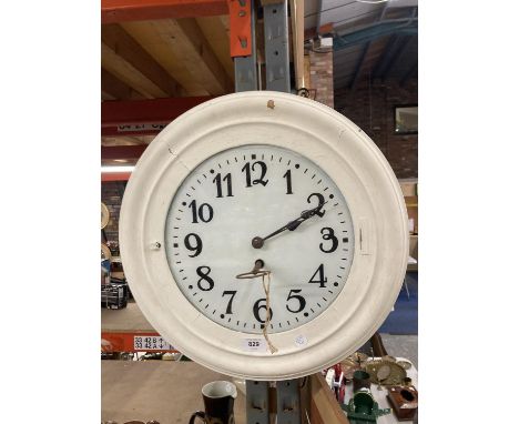 A VINTAGE WOODEN CASED WALL CLOCK PAINTED WHITE COMPLETE WITH KEY 