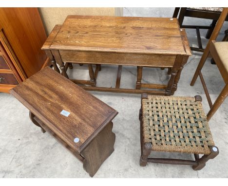 AN OAK NEST OF THREE TABLES, MAGAZINE RACK/TABLE AND A STOOL 