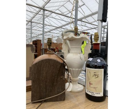 A BOTTLE LAMP, A RUSTIC WOODEN LAMP AND AN ALABASTER LAMP 
