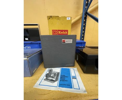 A BOXED KODAK INSTAMATIC M55-L MOVIE PROJECTOR 