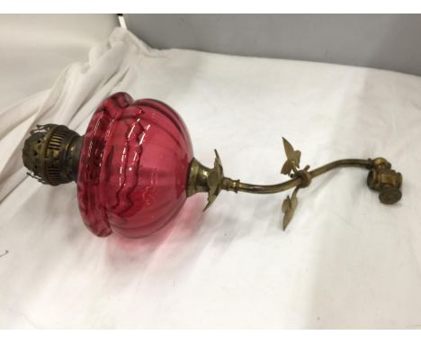 A CRANBERRY GLASS WALL OIL LAMP 