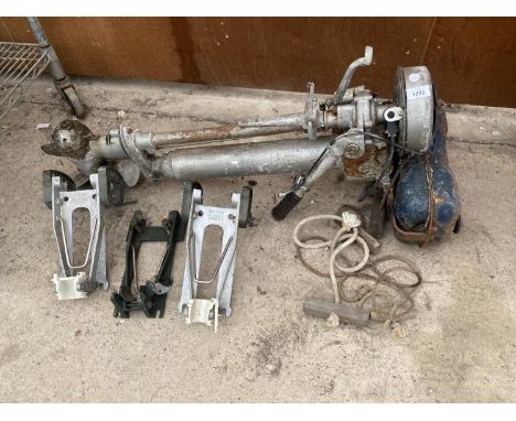 A PETROL ENGINE OUTBOARD MOTOR AND THREE OUT BOARD MOTOR CLAMPS 