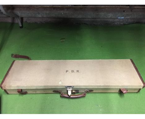 A HARD VINTAGE GUN CASE WITH LEATHER STRAPS AND HANDLE.  HAS THE INITIALS P. B. R. 84CM X 23CM X 8CM 