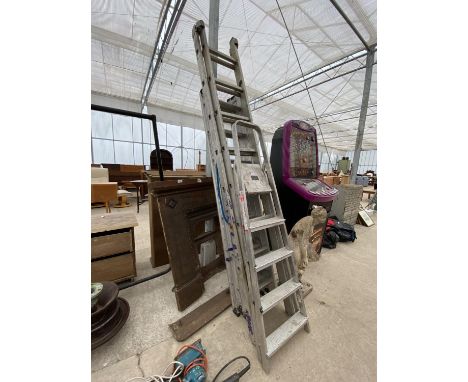 A COLLECTION OF VARIOUS ALUMINIUM LADDERS TO INCLUDE A FOUR RUNG STEP LADDER AND TWO EXTENDABLE LADDERS 