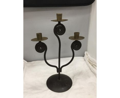 A THREE STEMMED METAL CANDLESTICK HEIGHT 41CM 