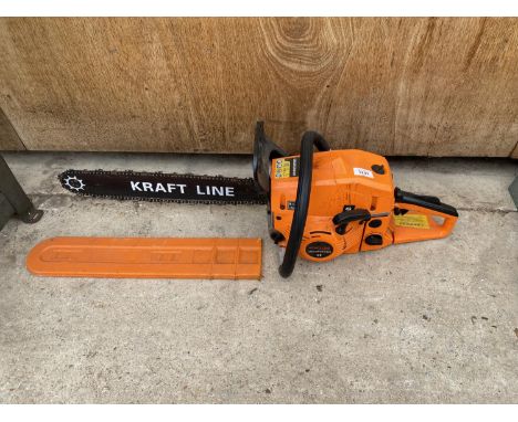 A KRAFT LINE GASOLINE CHAINSAW BELIEVED IN WORKING ORDER BUT NO WARRANTY 