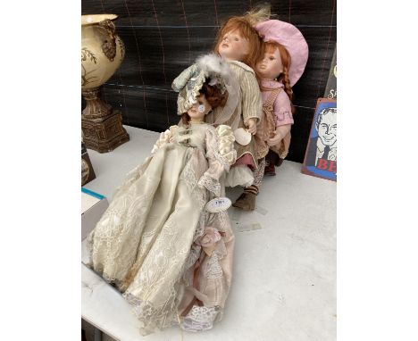 FOUR CHILDRENS DOLLS WITH CERAMIC HEADS 